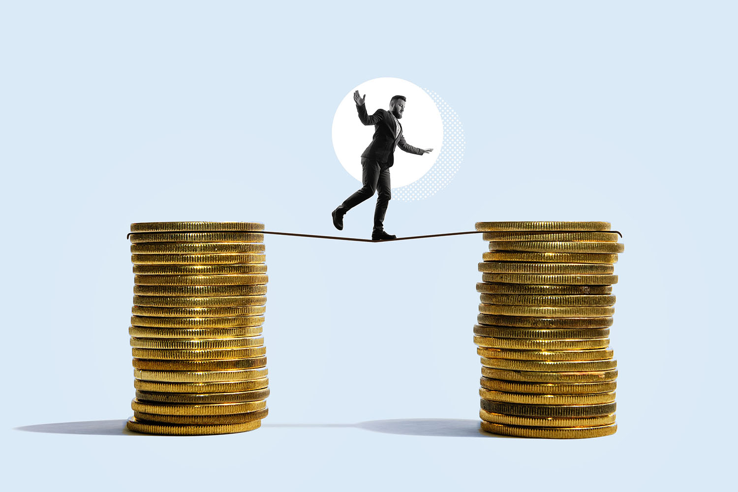 a man walking above 2 lines of coins in investing and saving article